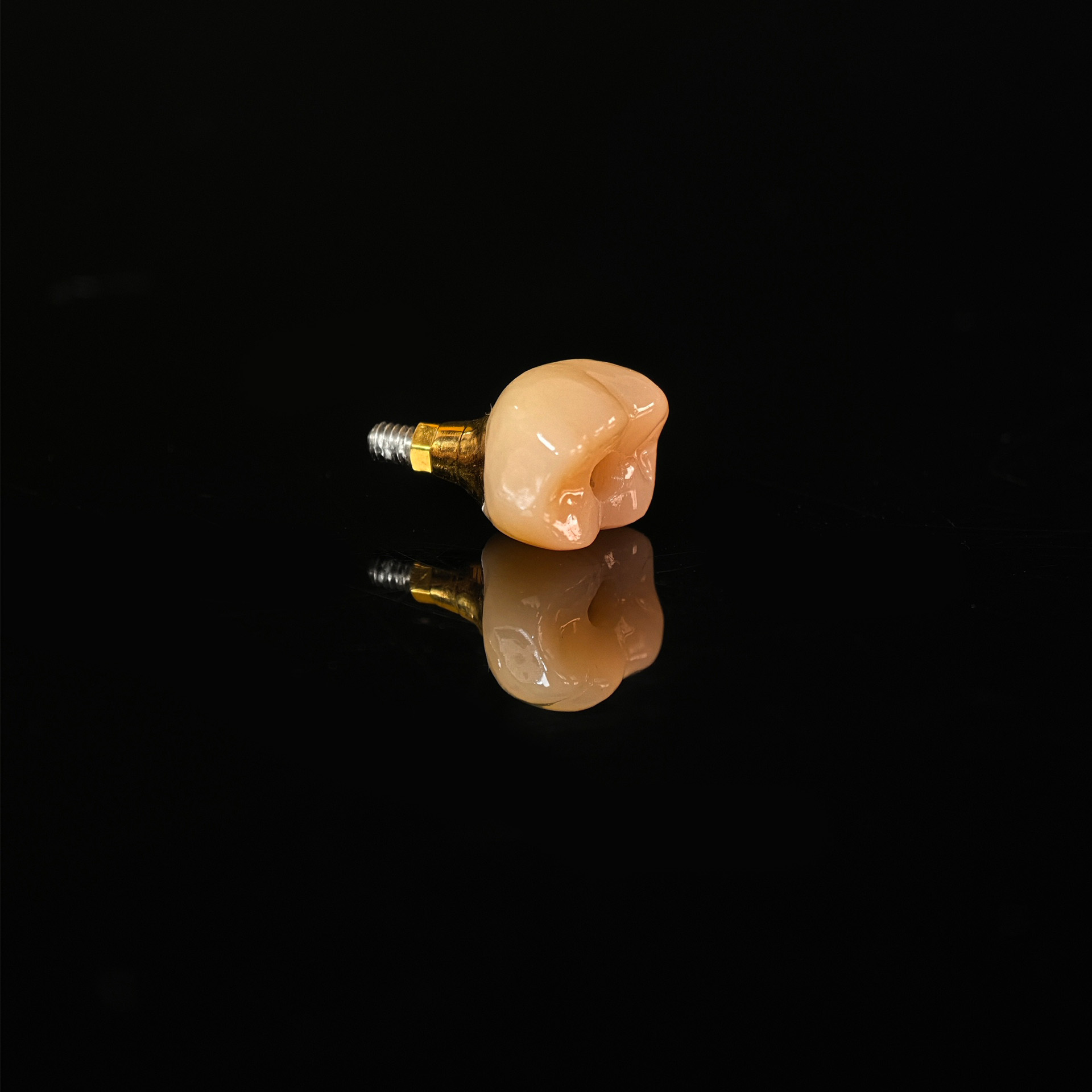 Zirconia implant crown with gold plating